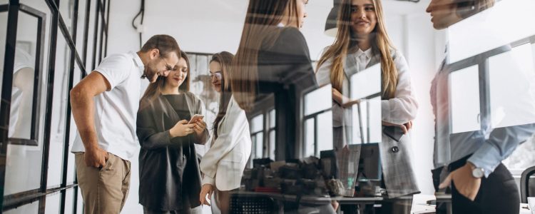 Group of people working out business plan in an office